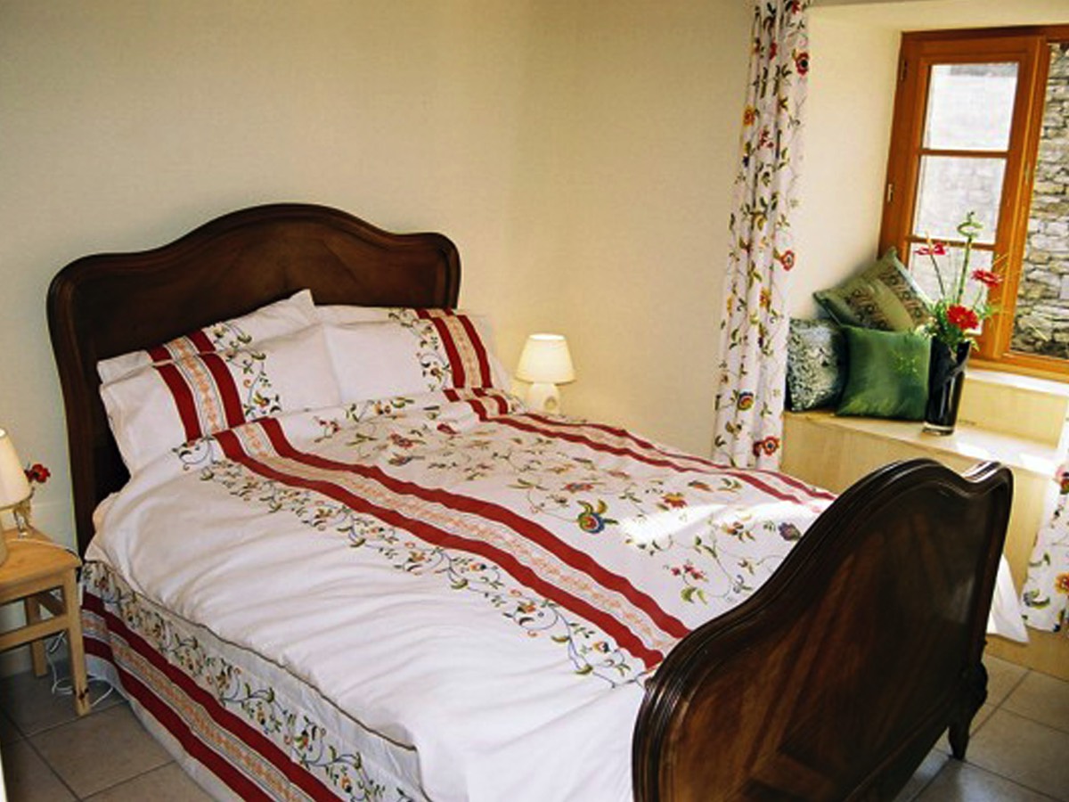 Double Bedroom at Wisteria Cottage in Sigournais