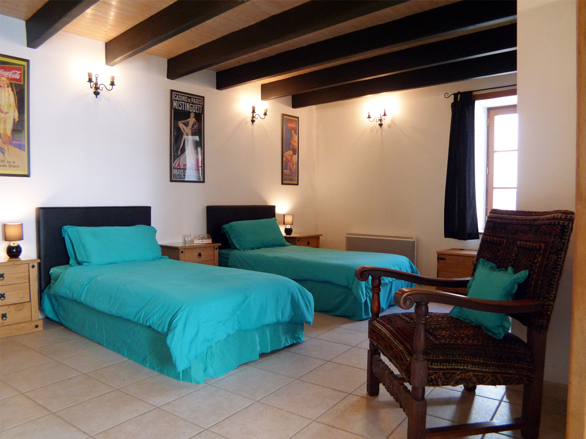 Large Twin Bedroom at Courtyard House in Sigournais